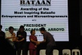 Gonzales being awarded by the President of the Philippines.