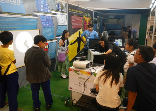 High school and elementary students are photographed interacting with the latest UP Diliman innovations at the National Science and Technology Week Event (10 – 14 July 2012) at the SMX Convention Center; the exhibits will be on display also at NIP during the OVCRD Colloquium and Fair 2012 on 8 August 2012.